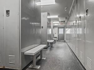 a row of benches in an empty locker room at Expedition Station 313 Next To Slopes And Bike Trails WiFi Village in Snowshoe