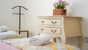 Postel nebo postele na pokoji v ubytování APARTAMENT LO COR DEL DELTA