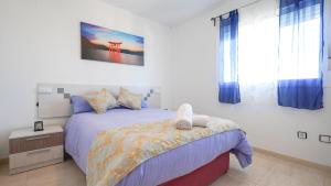 Postel nebo postele na pokoji v ubytování APARTAMENT LO COR DEL DELTA