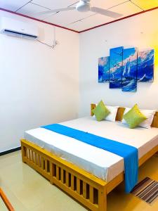 Ένα ή περισσότερα κρεβάτια σε δωμάτιο στο Mangrove Bay Inn