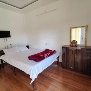 Ένα ή περισσότερα κρεβάτια σε δωμάτιο στο TEA house