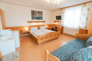Postel nebo postele na pokoji v ubytování Gasthaus Bauer