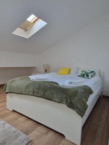 Ένα ή περισσότερα κρεβάτια σε δωμάτιο στο Casa Sava - ultracentral