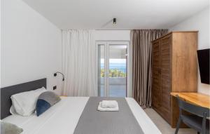 Posteľ alebo postele v izbe v ubytovaní Cozy Home In Blato With House Sea View
