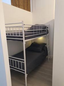 Postel nebo postele na pokoji v ubytování Loft Canet