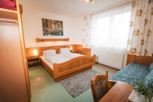 Postel nebo postele na pokoji v ubytování Gasthaus Bauer