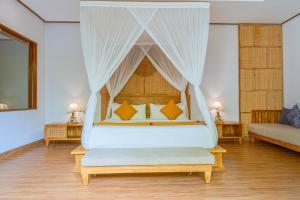 Sawitri Anandhita Luxury Villas客房内的一张或多张床位