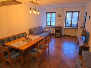 Posezení v ubytování ElvesHome - Alpine Stay Apartments + 14 fotografií