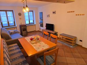 TV a/nebo společenská místnost v ubytování ElvesHome - Alpine Stay Apartments