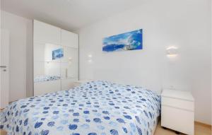 Postel nebo postele na pokoji v ubytování Pet Friendly Home In Punat With Kitchen
