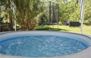 Bazén v ubytování Two-Bedroom Holiday Home In Blato Na Cetini nebo v jeho okolí