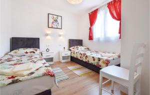 Postel nebo postele na pokoji v ubytování Two-Bedroom Holiday Home In Blato Na Cetini + 17 fotografií