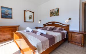 Posteľ alebo postele v izbe v ubytovaní Two-Bedroom Holiday Home In Ploce