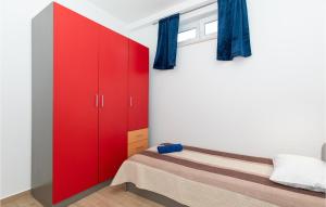 Posteľ alebo postele v izbe v ubytovaní Two-Bedroom Holiday Home In Ploce
