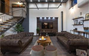 a living room with a couch and a table at Villa Arcus in Pakoštane