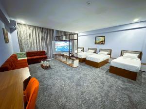 Postel nebo postele na pokoji v ubytování Amazon Hotel - Free Massage + 37 fotografií