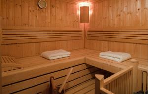 a wooden sauna with two towels sitting in it at Villa Quentin in Vodice +34 photos