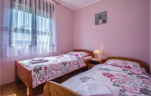 Posteľ alebo postele v izbe v ubytovaní Lovely Home In Pula With Kitchen