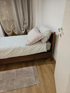 Postel nebo postele na pokoji v ubytování Mxp Room Busto