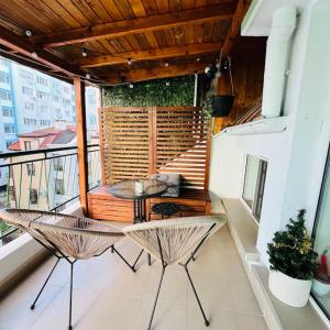 Μπαλκόνι ή βεράντα στο Cosy apartment near the beach with terrace & sea view