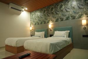 SKD RESORT AND CLUB客房内的一张或多张床位