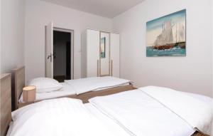 Łóżko lub łóżka w pokoju w obiekcie Holiday Home Vrsi I