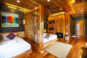 Postel nebo postele na pokoji v ubytování Andalay Beach Resort Koh Libong