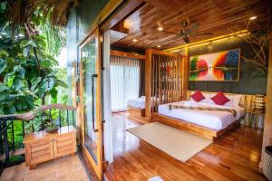 Postel nebo postele na pokoji v ubytování Andalay Beach Resort Koh Libong