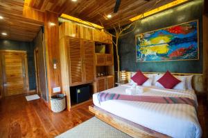 Postel nebo postele na pokoji v ubytování Andalay Beach Resort Koh Libong