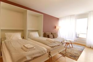 Postel nebo postele na pokoji v ubytování Lorez 5A by Arosa Holiday