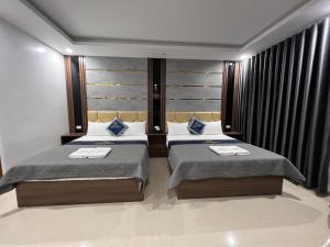 Posteľ alebo postele v izbe v ubytovaní Ruby 2 Hotel