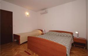Postel nebo postele na pokoji v ubytování Apartment Korcula With Sea View Vi