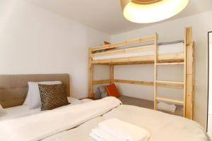Katil atau katil-katil dalam bilik di Lorez 5D by Arosa Holiday "neu renoviert"