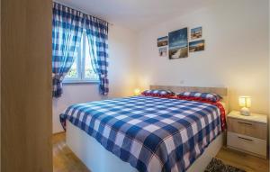 Posteľ alebo postele v izbe v ubytovaní 2 Bedroom Awesome Apartment In Labin