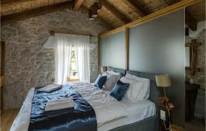 En eller flere senge i et værelse på Villa Blazeni Miroslav Bulesic