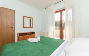 Postel nebo postele na pokoji v ubytování Holiday Home Privlaka 03