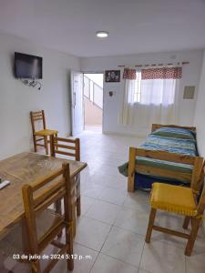 Postel nebo postele na pokoji v ubytování Casas de Carlos en San Rafael COMPLEJO RIO BAMBA