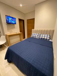Postelja oz. postelje v sobi nastanitve Habitaciones con Baño
