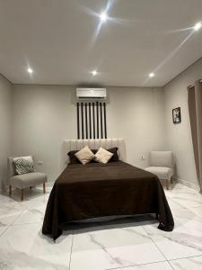 Voodi või voodid majutusasutuse Habitaciones con Baño toas