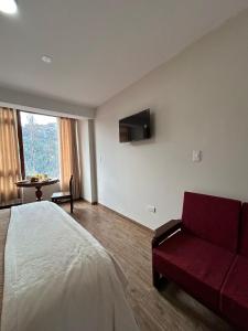 TV in/ali zabaviščno središče v nastanitvi JUAN PLACIDO Hospedaje