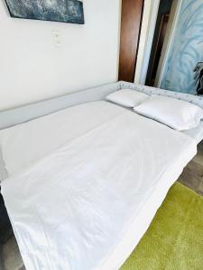 Postel nebo postele na pokoji v ubytování Jasmina