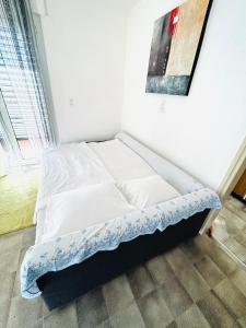 Postel nebo postele na pokoji v ubytování Jasmina