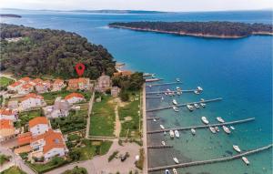 an aerial view of a harbor with boats in the water at 1 Bedroom Cozy Apartment In Palit in Palit