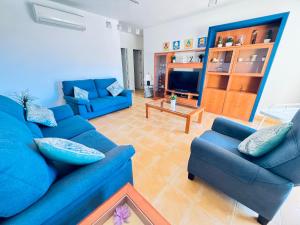 Et tv og/eller underholdning på Oasis Meloneras cerca del mar