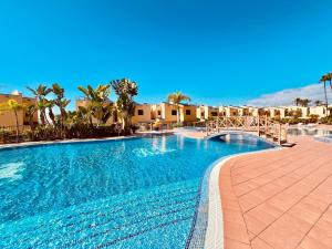 Swimmingpoolen hos eller tæt på Oasis Meloneras cerca del mar