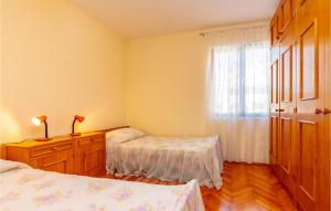 Postel nebo postele na pokoji v ubytování Apartment Zavalatica Iv