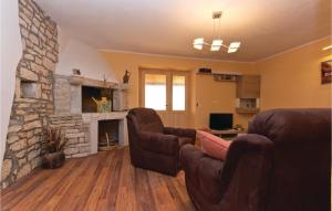 TV a/nebo společenská místnost v ubytování Holiday Home Peresiji I