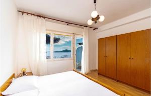 Posteľ alebo postele v izbe v ubytovaní Apartment Prizba - 03