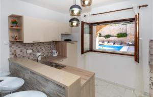 Ένα μπάνιο στο Six-Bedroom Holiday Home In Klek