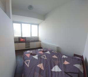 Krevet ili kreveti u jedinici u okviru objekta Apartmani Kuzman